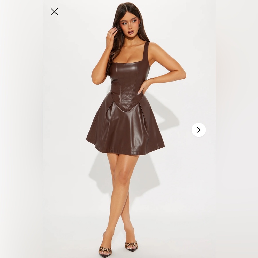 PU leather mini dress. New in original packaging. Size XL